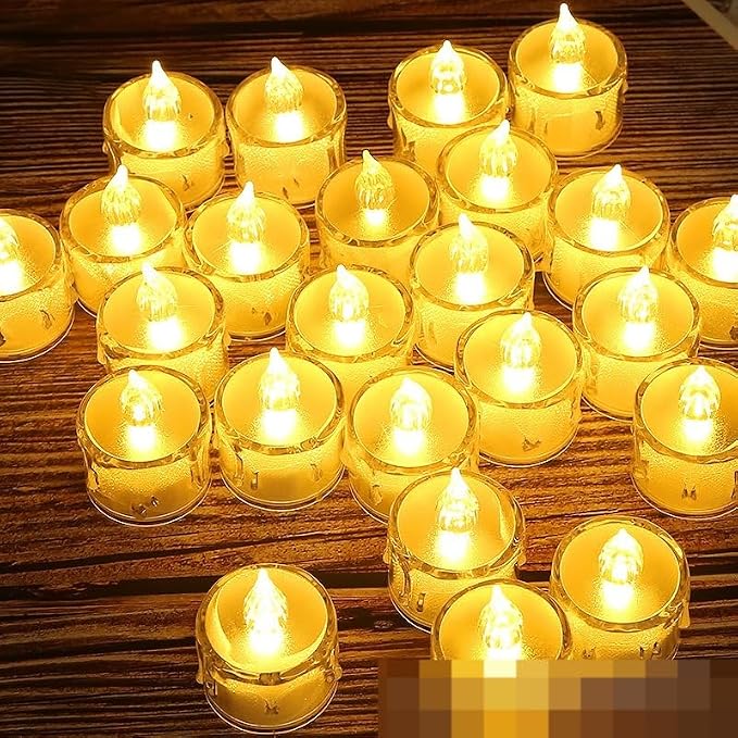 Battery-operated acrylic crystal pattern LED electronic candle lights, rose pattern projection tea candle lights, and flameless candle lights suitable for wedding, holiday, and home decor. PK 24