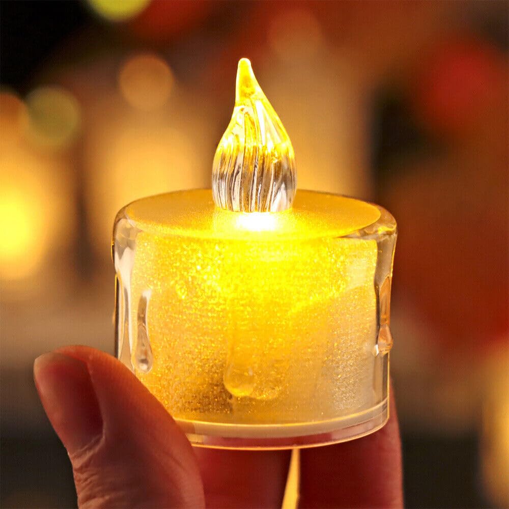 Battery-operated acrylic crystal pattern LED electronic candle lights, rose pattern projection tea candle lights, and flameless candle lights suitable for wedding, holiday, and home decor. PK 24